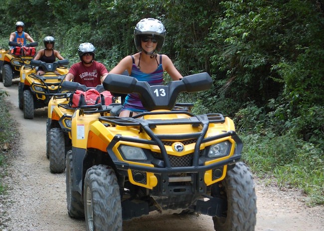 Connie enjoying an ATV tour with her family.